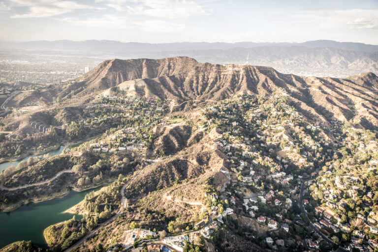 HOLLYWOOD, CA - SEPTEMBER 28, 2016: Hollywood sign and Los angeles view from helicopter.Originally created as advertisement for real estate development.